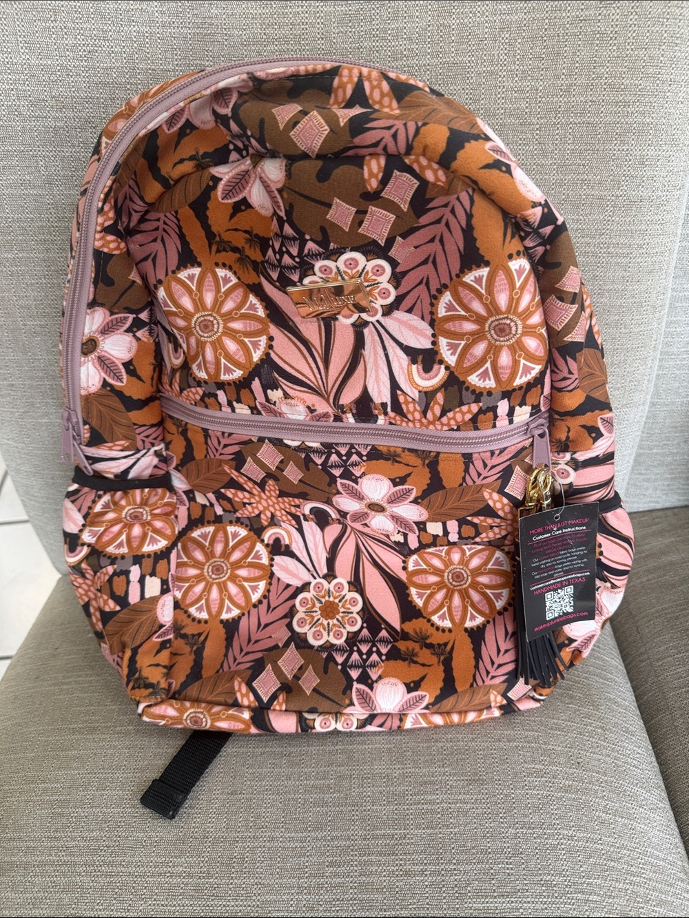 Floral Pink & Brown Backpack with Tassel Accent